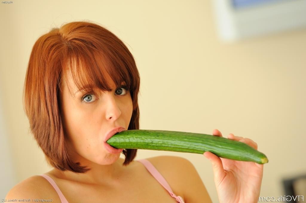 16P Nasty redhead rubbing her tits and toying pink with cucumber