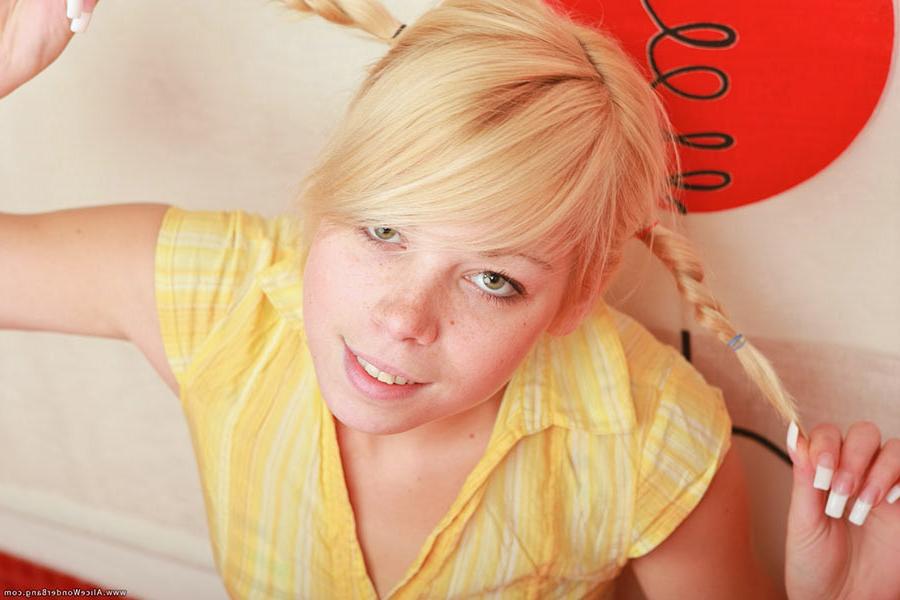 17P Small titted blonde teenie stuffing herself with banana