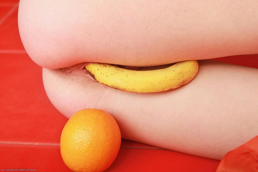 17P Small titted blonde teenie stuffing herself with banana