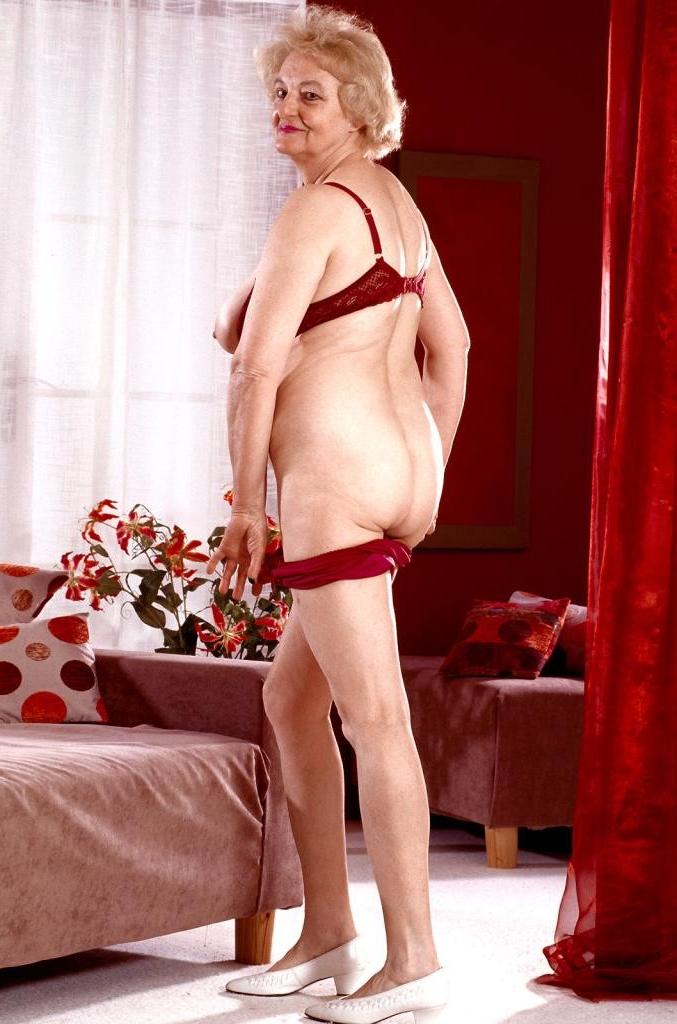 20P Horny mature in a dress and lingerie loves strip teasing
