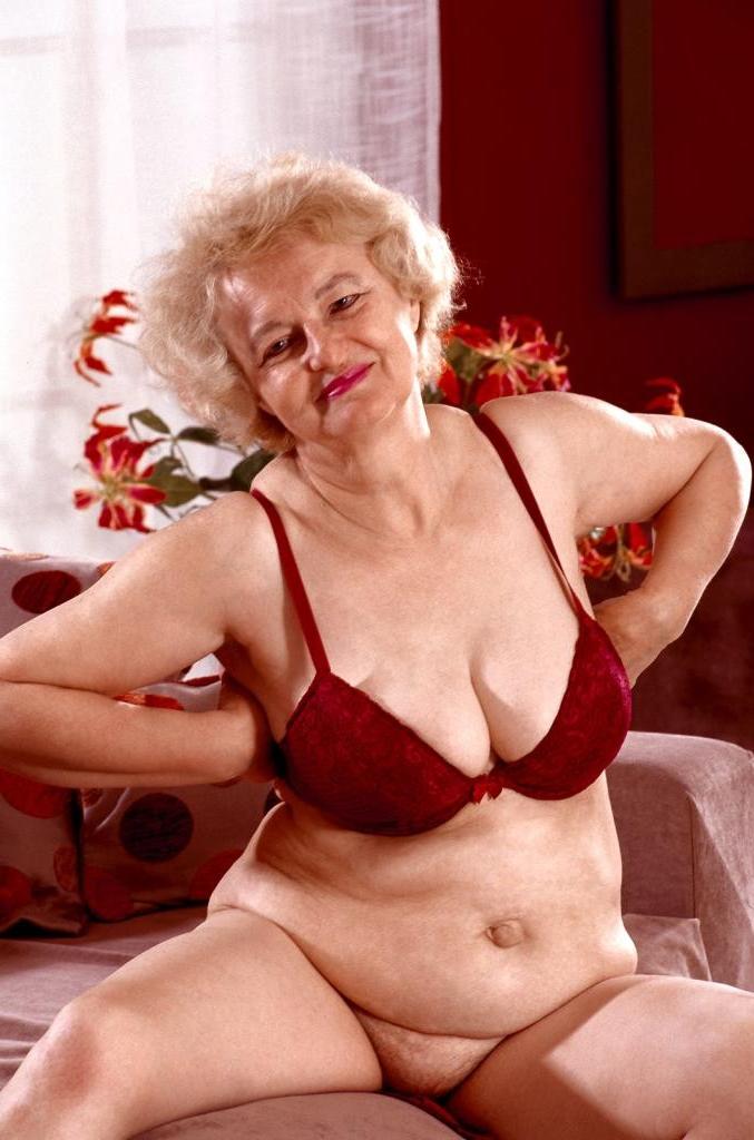 20P Horny mature in a dress and lingerie loves strip teasing