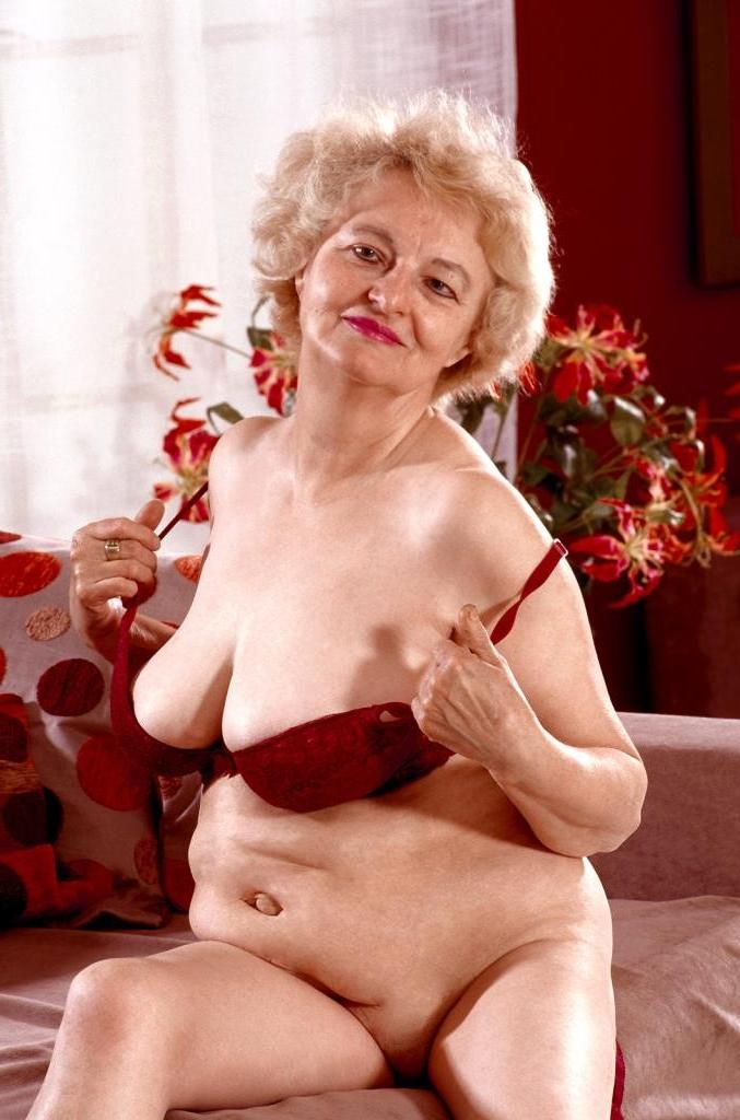 20P Horny mature in a dress and lingerie loves strip teasing