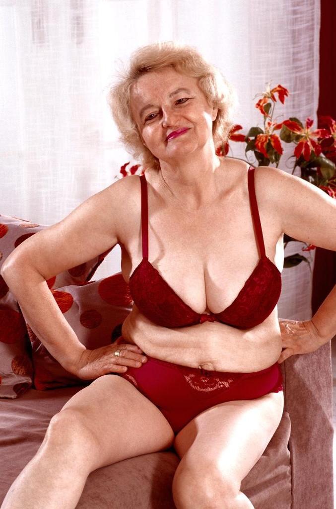 20P Horny mature in a dress and lingerie loves strip teasing