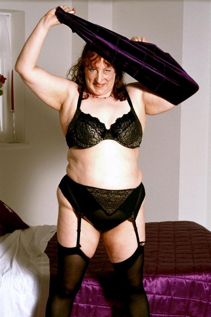 20P Mature in a dress strip teasing and spreading her pussy