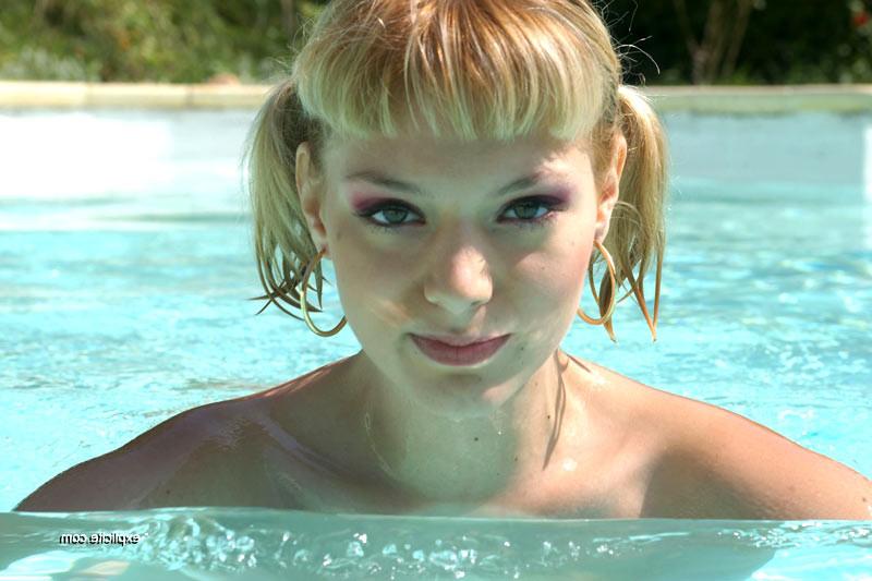 16P Pigtailed blonde gets her pussy toyed and fisted in a pool