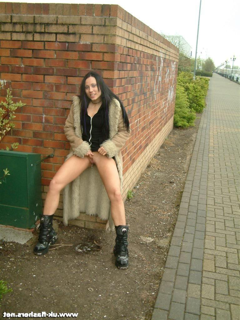 15P Cheeky goth exhibitionist sneaks a pee in a public place