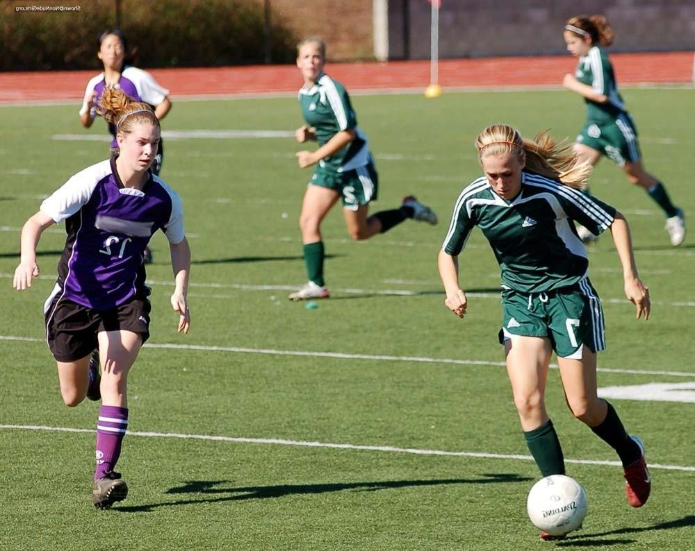 20P Teen girls playing soccer