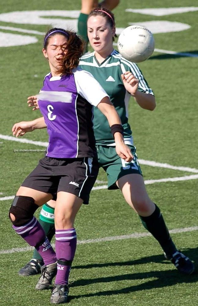 20P Teen girls playing soccer