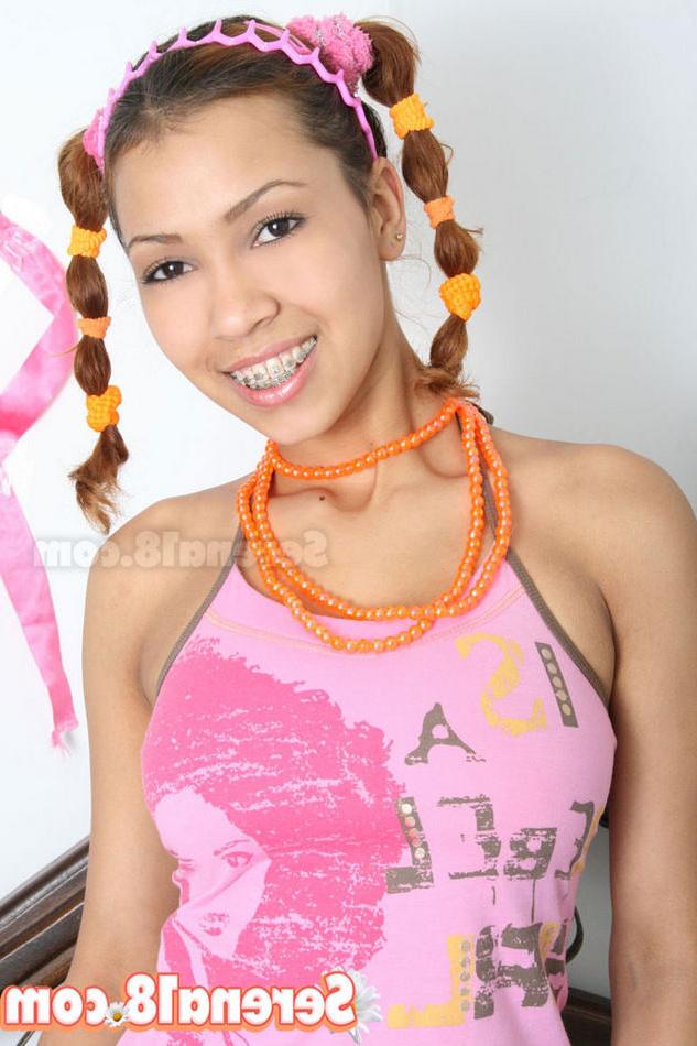 15P Eighteen year old in pigtails shows big round tits