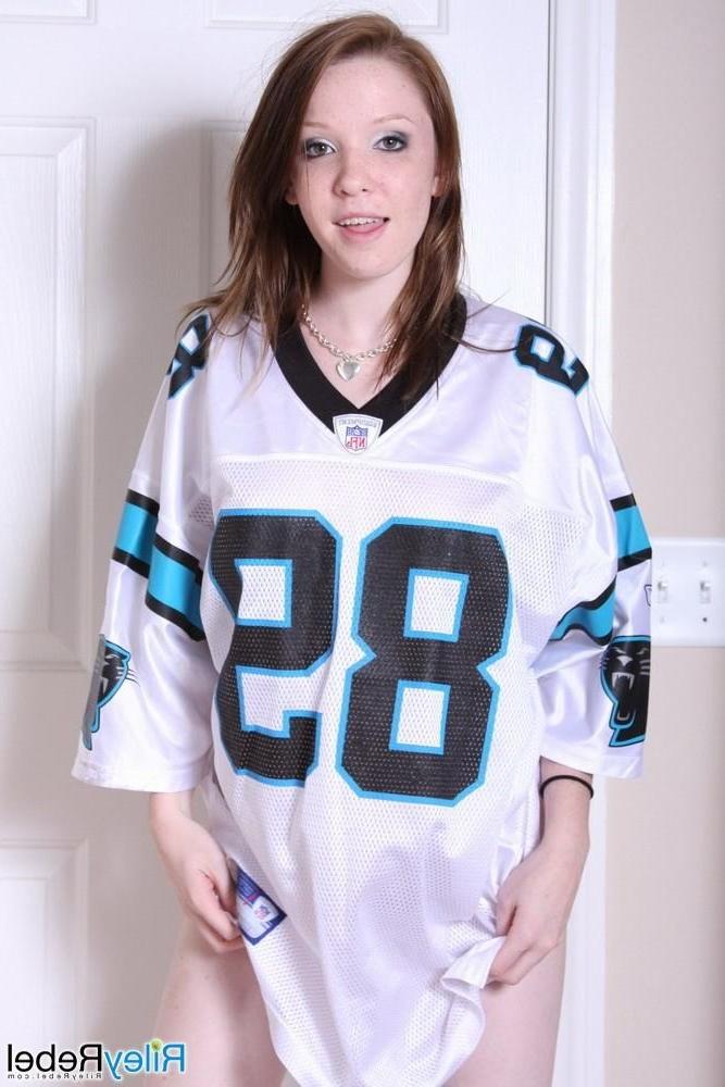 15P Petite small titted eighteen year old poses in football jersey