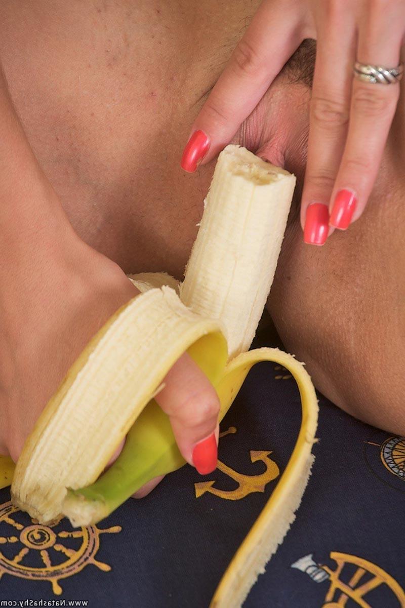 15P Hot petite teen babe plays with a banana