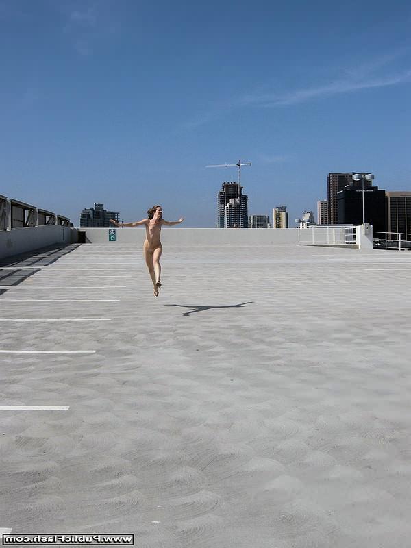 16P Tall gal strips publicly naked on parkade topfloor