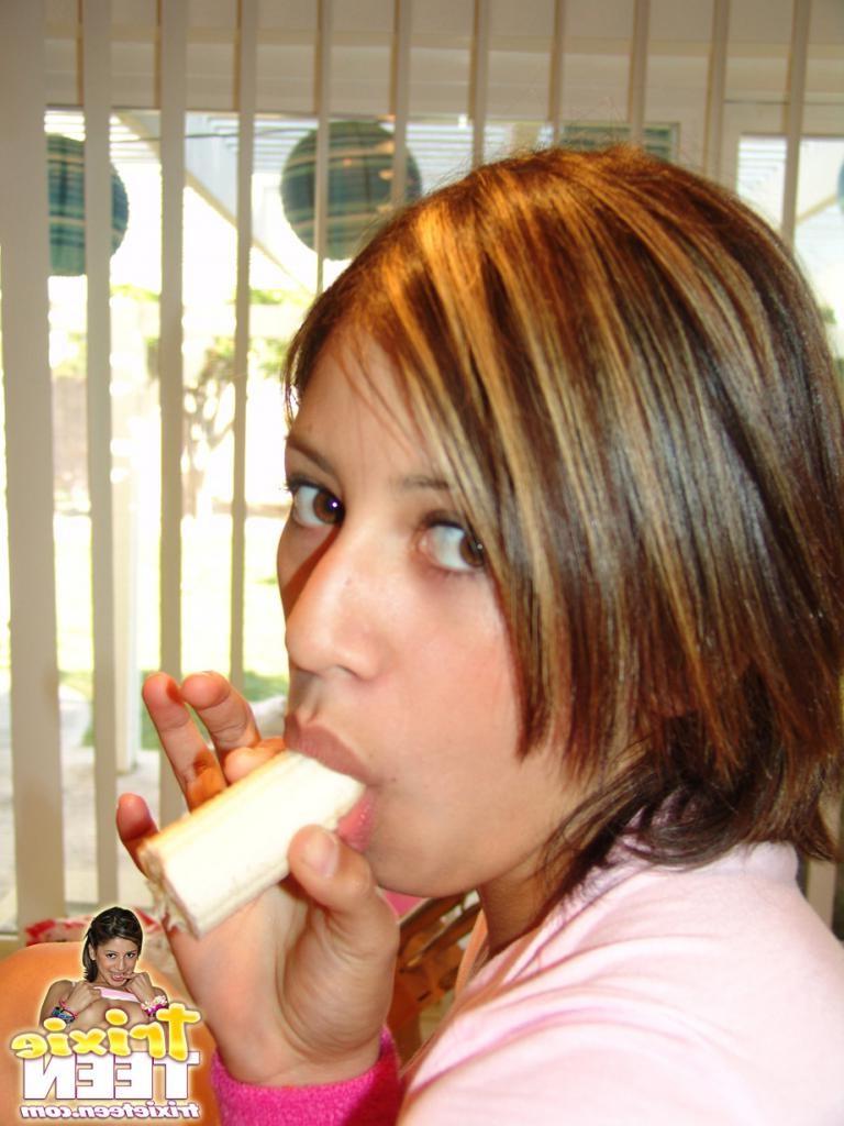 16P Brunette amateur teenie sucks on a banana sexy