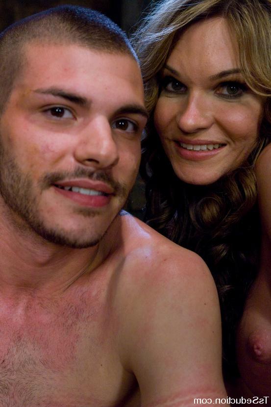 15P Latex TS Kelly Shore gets blowjob from her bound toy boy