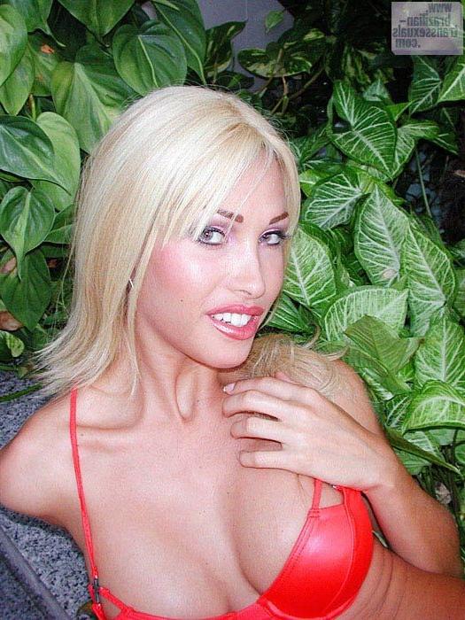 15P Tall and beautiful well hung blonde shemale strips