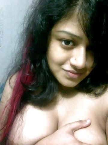 25P indian girl showing her big natural tits and shaved pussy