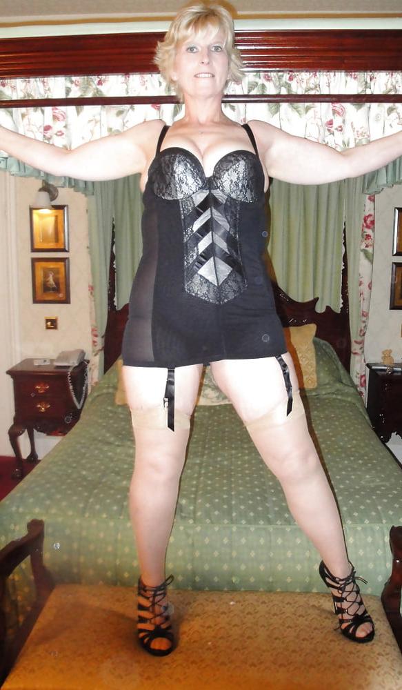14P Sexy blonde mature in selection of naughty lingerie poses
