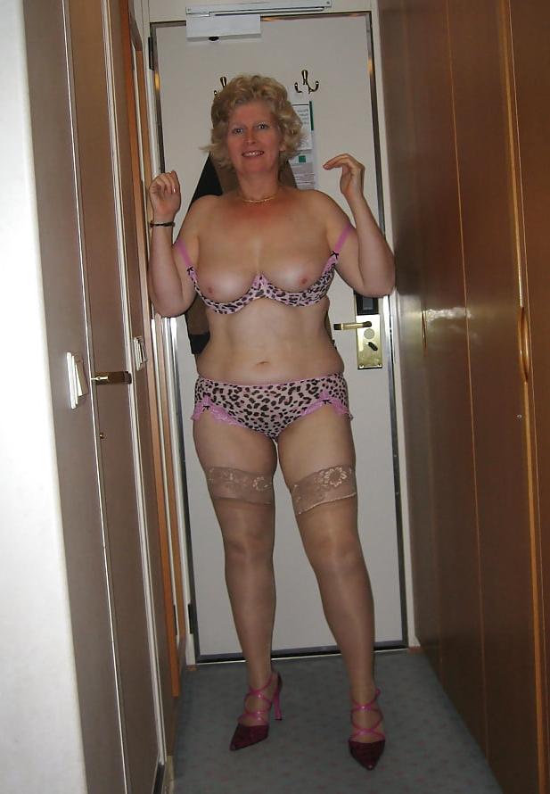 14P Sexy blonde mature in selection of naughty lingerie poses
