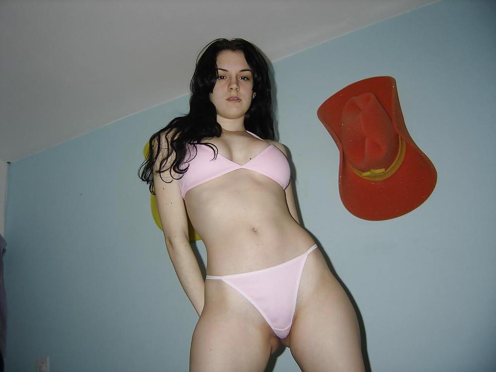 25P TEEN POSING ON A BED