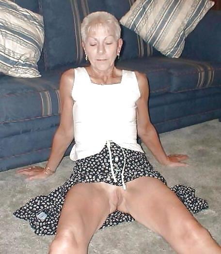 23P Hot Skinny short-haired granny fucks bottle