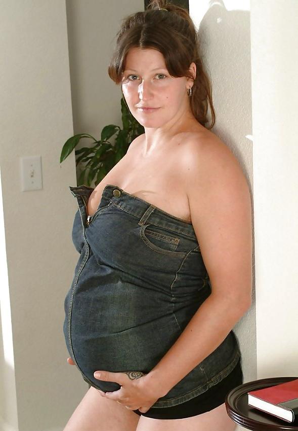 14P Busty pregnant brunette undressing