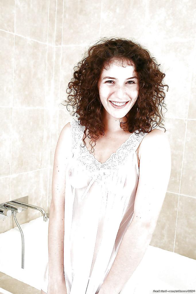 16P Stunning brunette taking a bath in lingerie