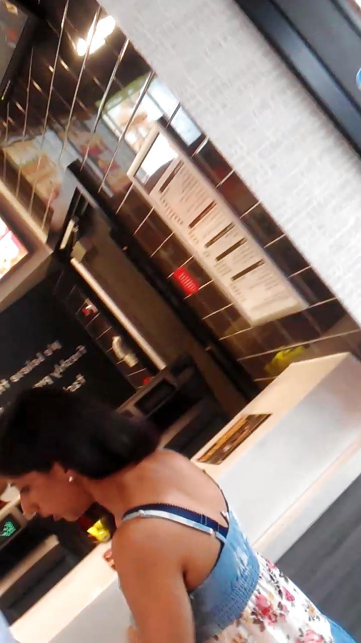 14P London indian girl in summer dress with bra strap showing