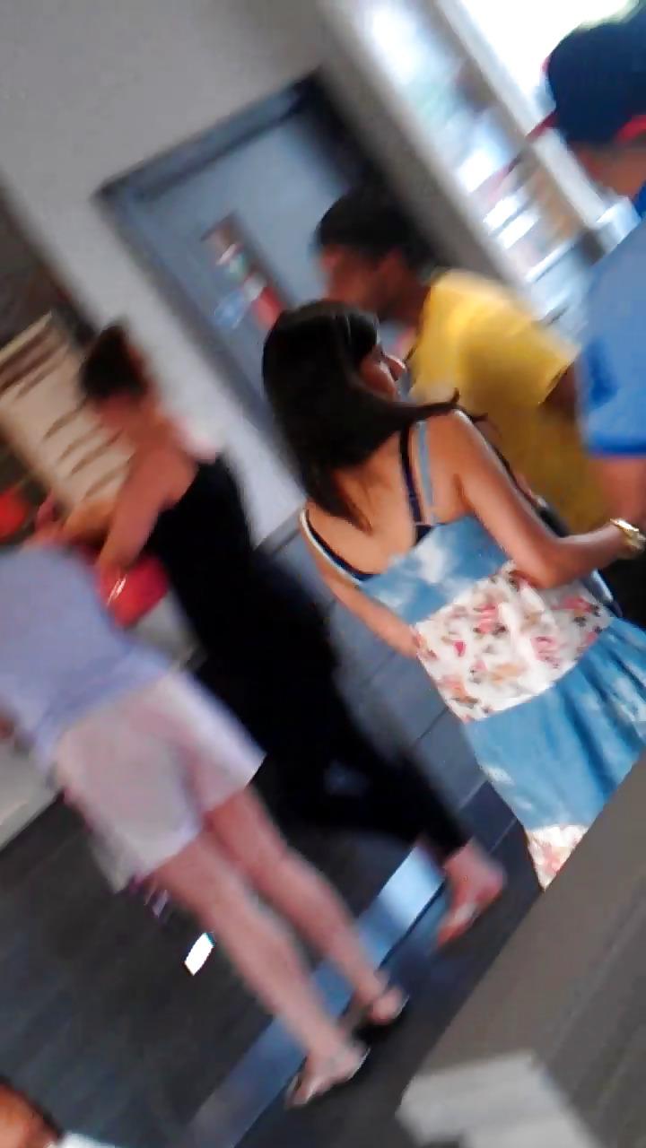 14P London indian girl in summer dress with bra strap showing