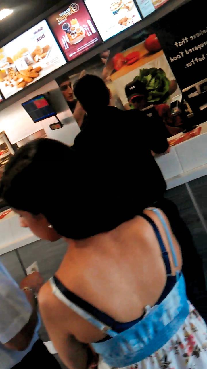 14P London indian girl in summer dress with bra strap showing