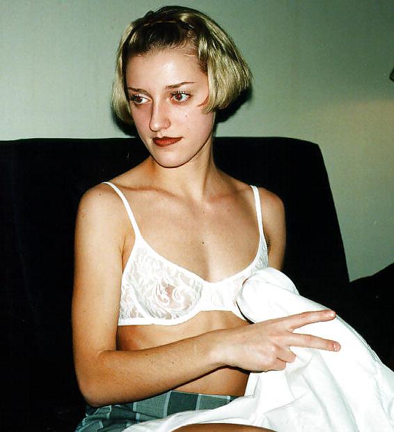 17P Blonde undressing in her living room