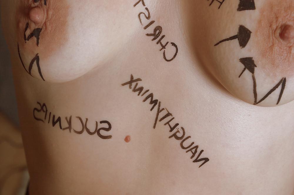 18P Writing on tits