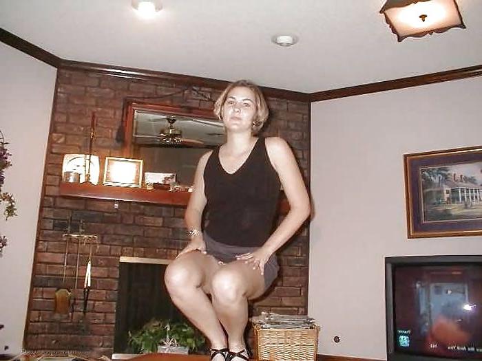 15P Blonde stripping in her living room