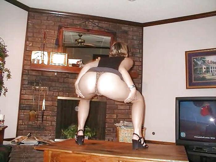 15P Blonde stripping in her living room