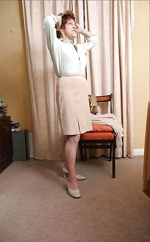 20P Older women striptease.