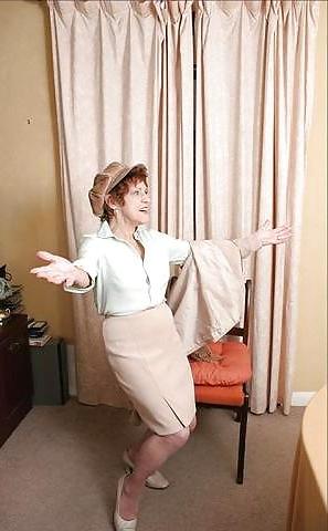 20P Older women striptease.