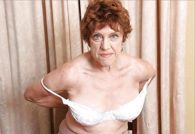 20P Older women striptease.