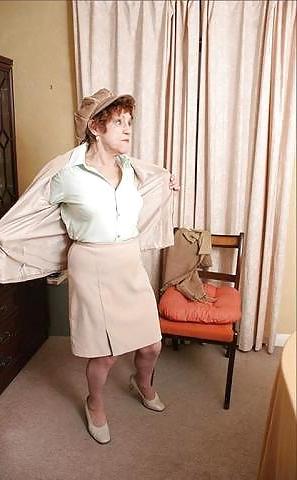 20P Older women striptease.