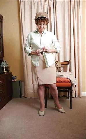 20P Older women striptease.