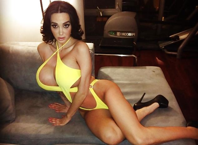 13P Amy shows off her huge fantastic fake tits!
