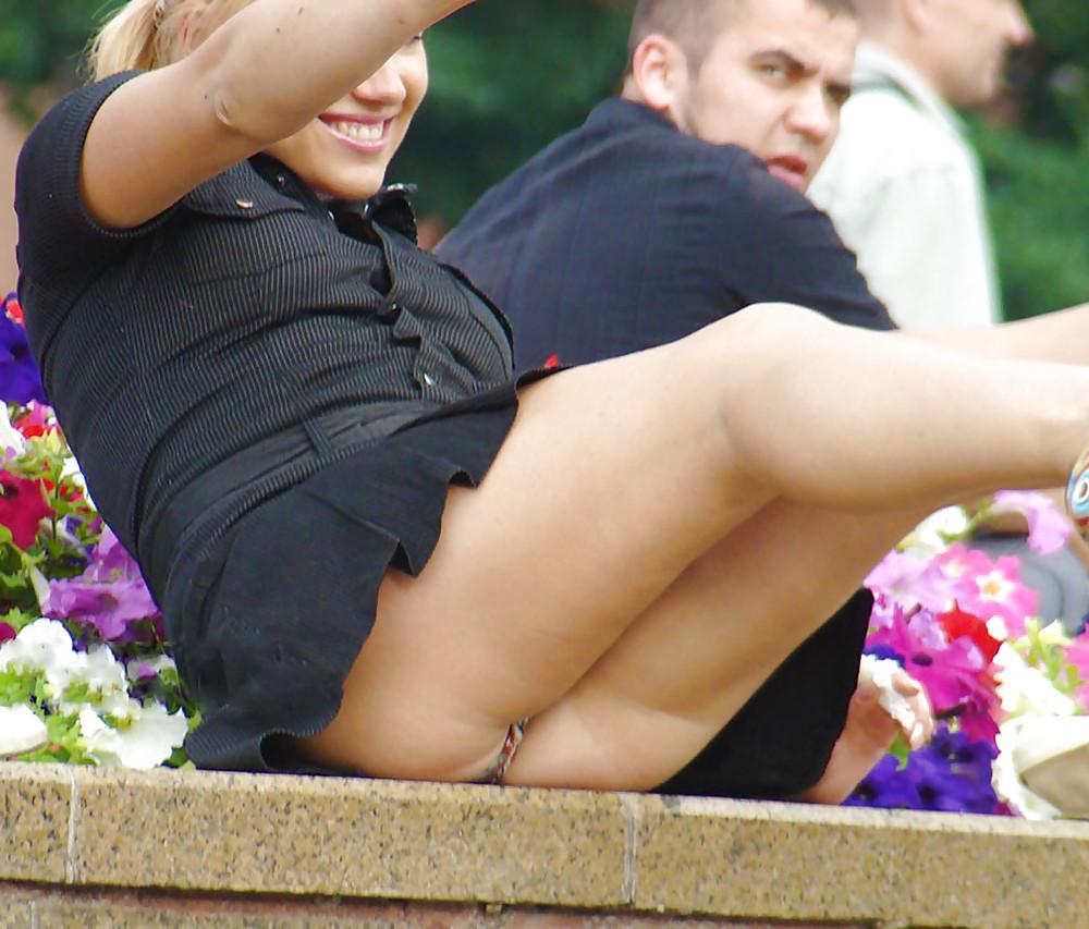 10P In The Streets 093 - Windy Sitting Upskirts