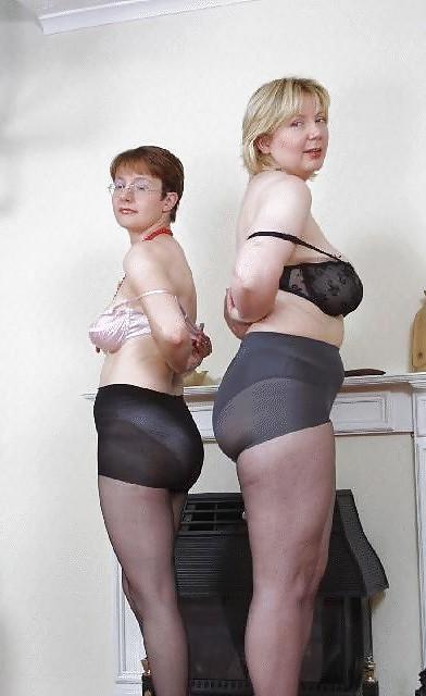 19P Two older women striptease.