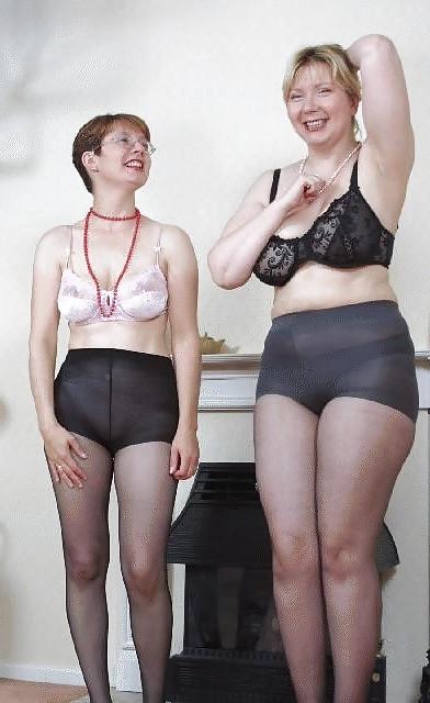19P Two older women striptease.