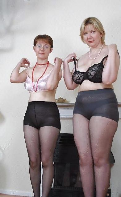 19P Two older women striptease.