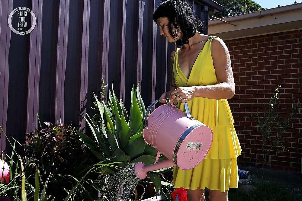 16P Small titted Aussie girl watering her hairy cunt