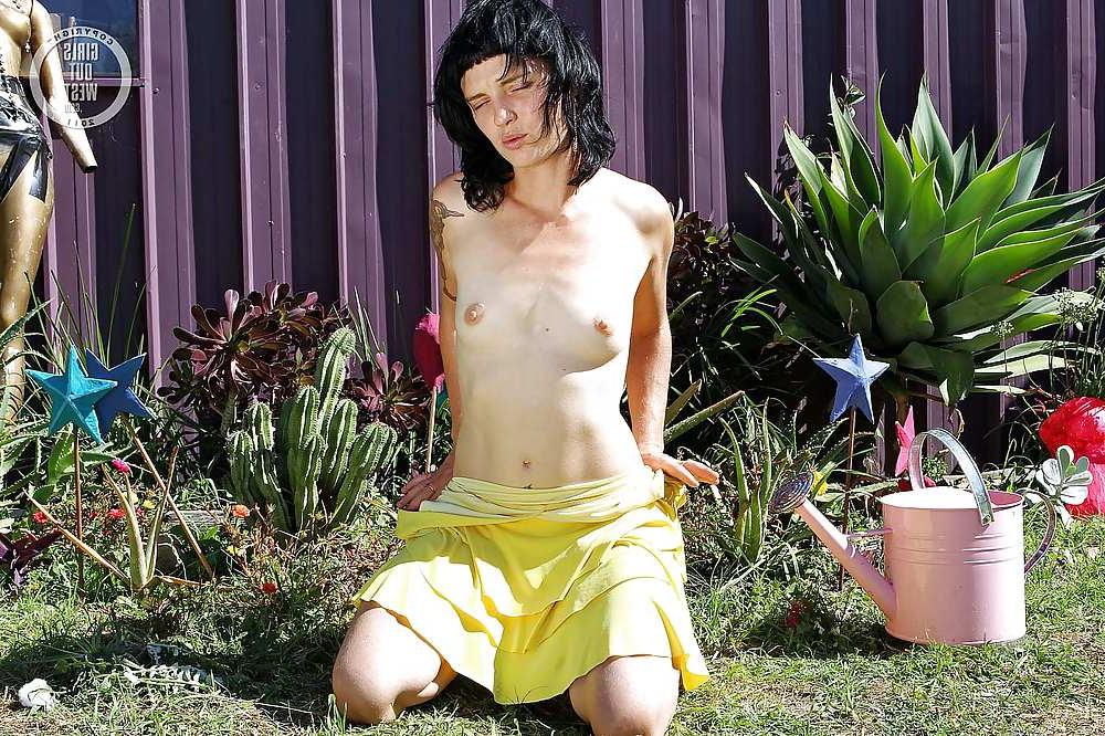 16P Small titted Aussie girl watering her hairy cunt