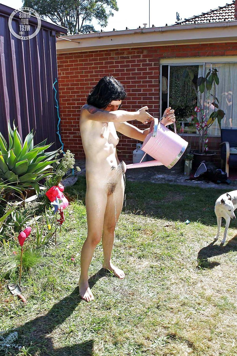 16P Small titted Aussie girl watering her hairy cunt