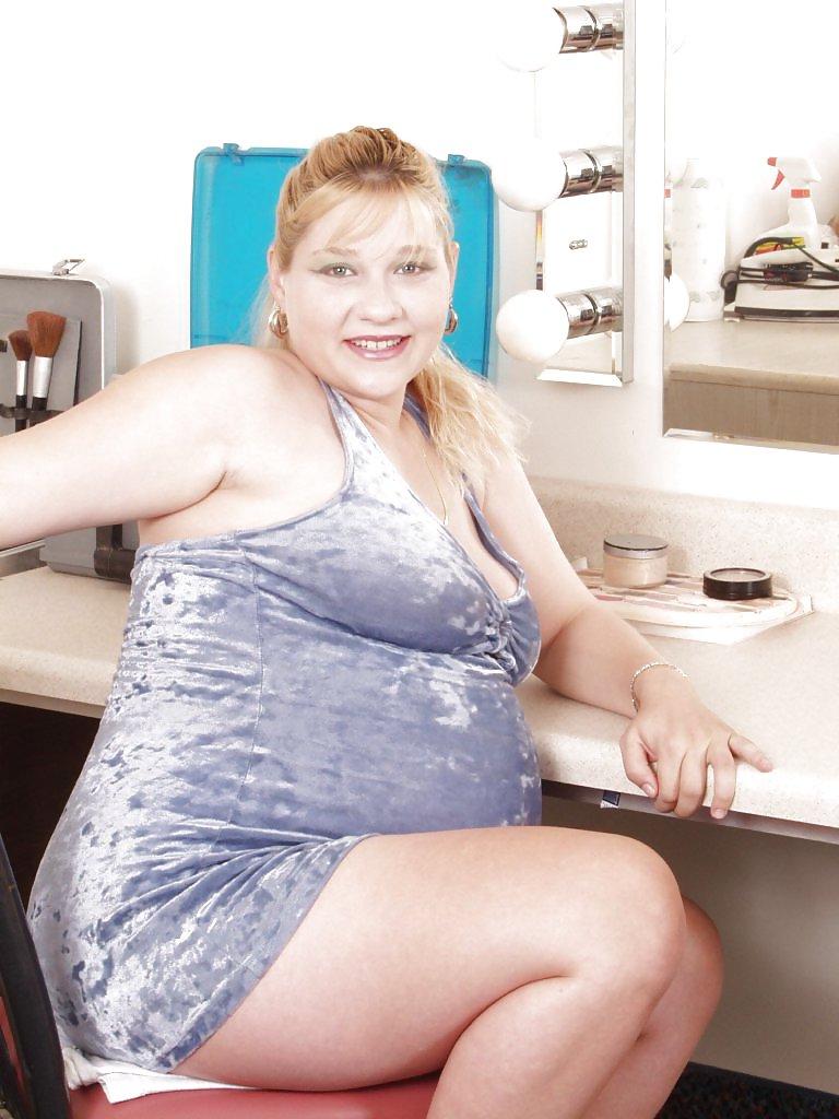15P Pregnant blonde posing in her dressing room