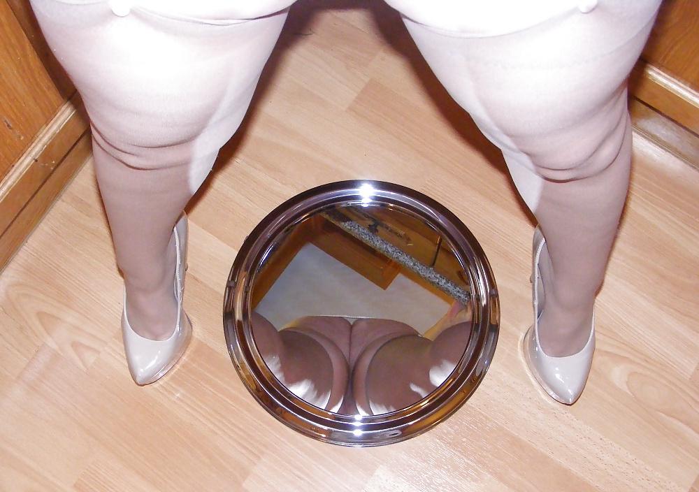 25P Slutty secretary in girdle, stockings and platform heels