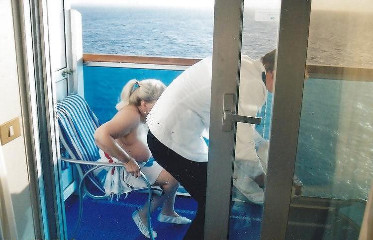 15P Showing her tits to the room service and the passing boaters