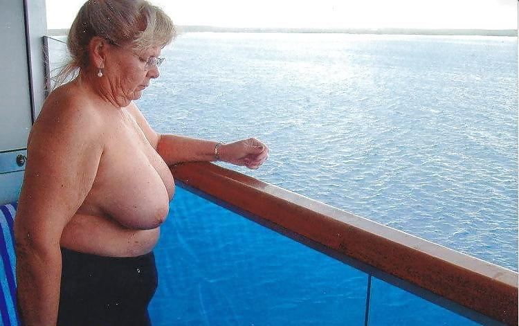 15P Showing her tits to the room service and the passing boaters